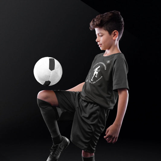 custom-soccer-jerseys-boy-playing-with-the-ball-at-a-studio-a16604